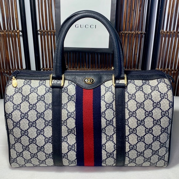 Gucci Handbags - Gucci Authentic Vintage large canvas Boston bag!